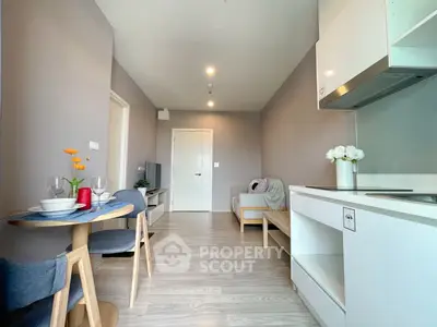 Modern living room with sleek kitchen in open layout apartment