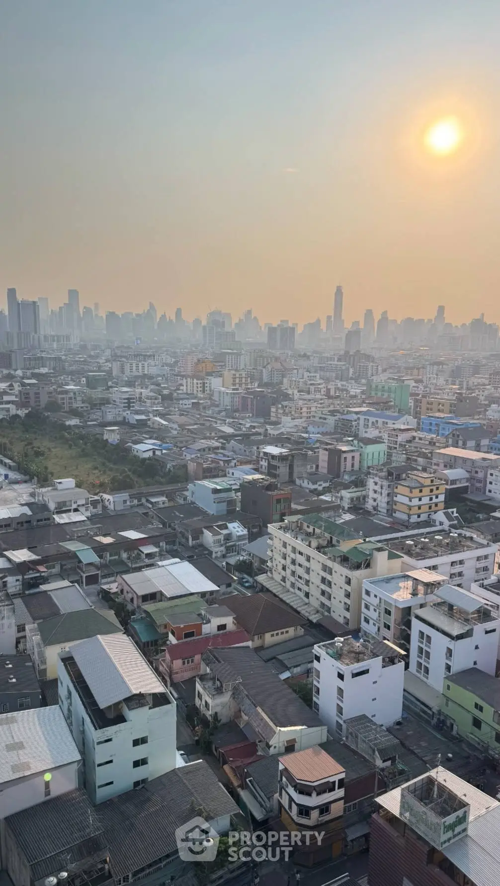 Stunning cityscape view showcasing urban skyline at sunset, perfect for real estate investment opportunities.
