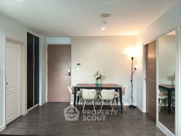 Modern dining area with sleek furniture and ambient lighting