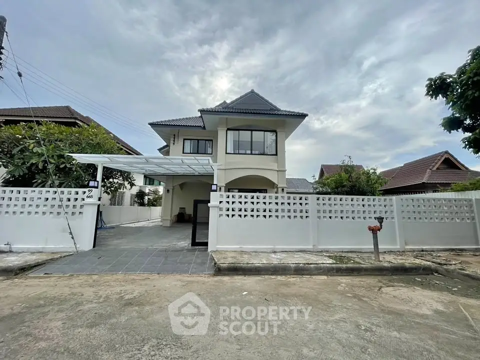 Charming two-story house with modern design and spacious driveway