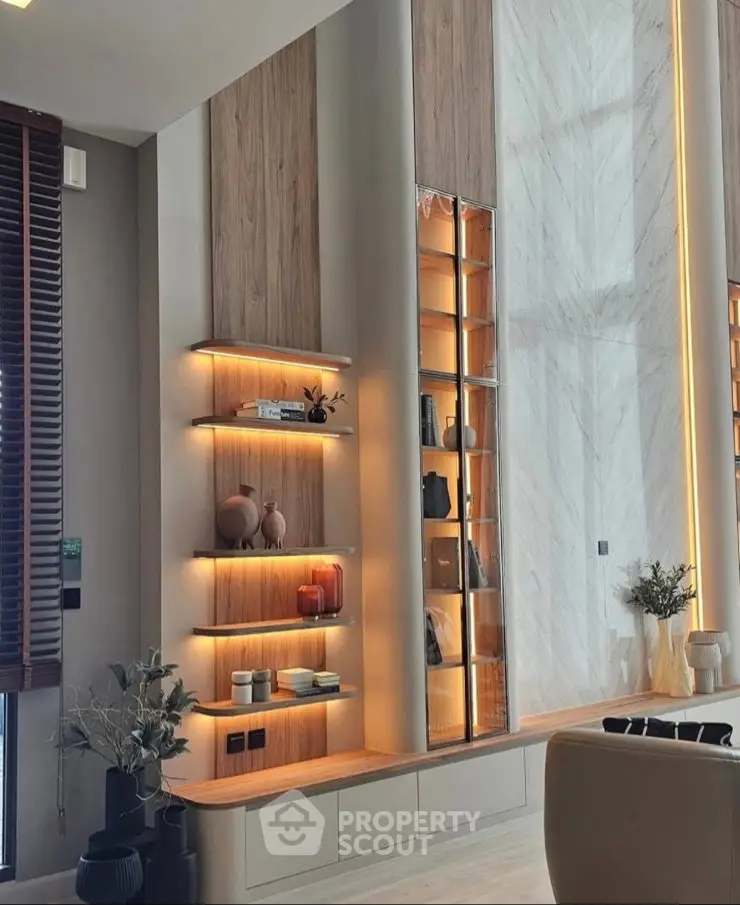 Luxurious modern living room with elegant shelving and ambient lighting