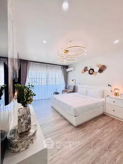 Luxurious modern bedroom with elegant decor and natural light
