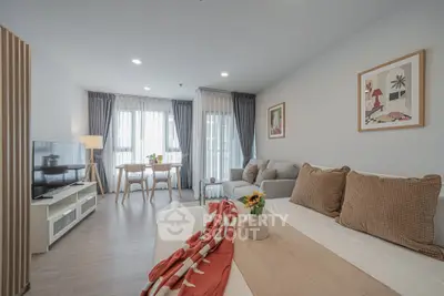 Modern studio apartment with cozy living area and stylish decor