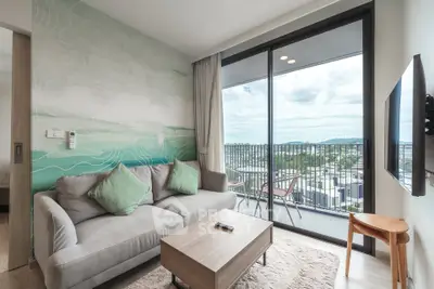 Modern living room with balcony view in a stylish apartment