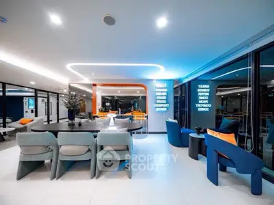 Modern living room with sleek furniture and ambient lighting in a luxury apartment.