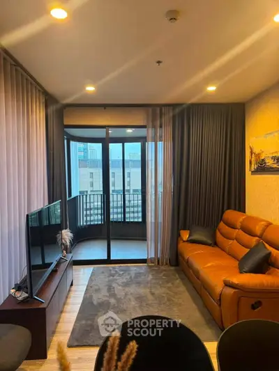Modern living room with leather sofa and city view balcony, perfect for urban living.