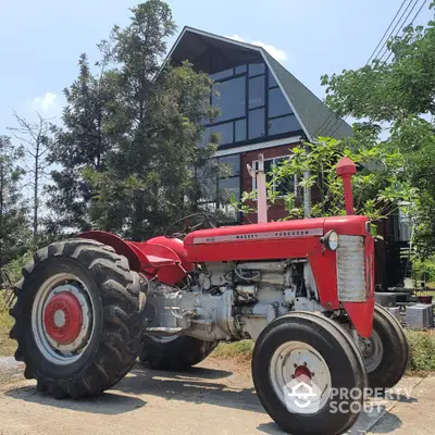 Charming countryside property with vintage tractor and modern glass facade