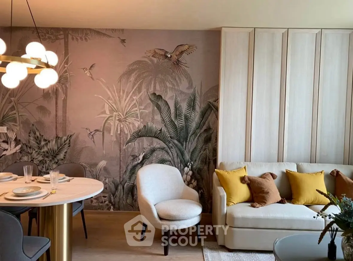 Stylish living room with tropical wallpaper and modern furniture, perfect for urban living.