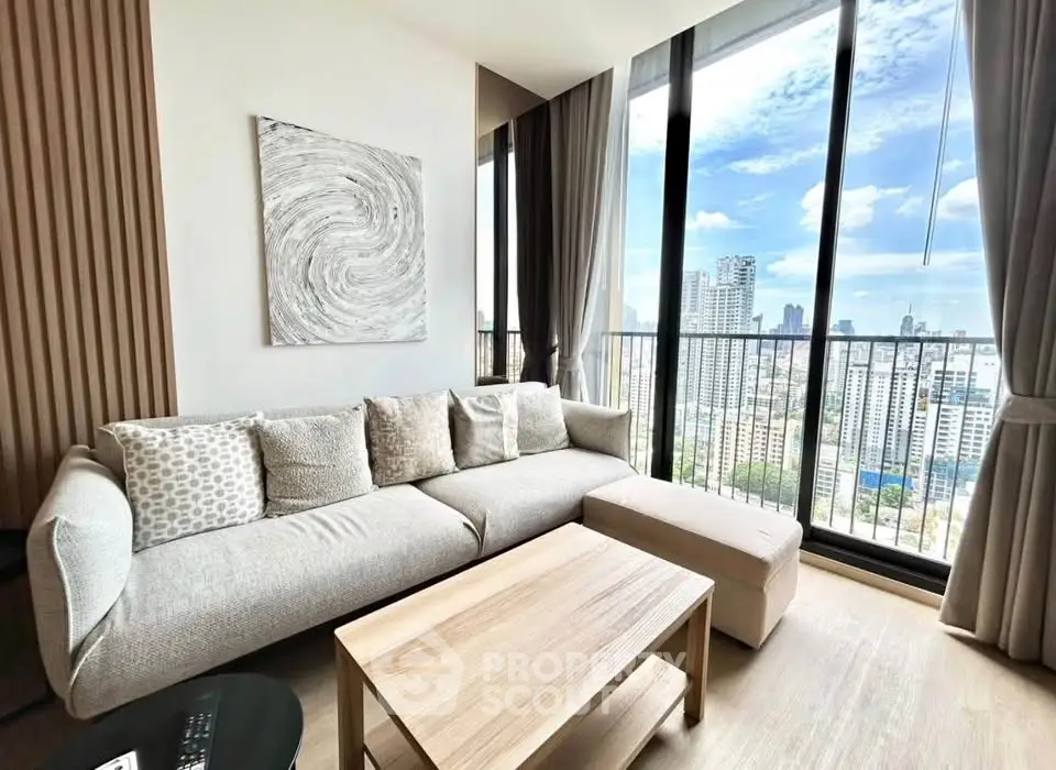 Modern living room with floor-to-ceiling windows and city view