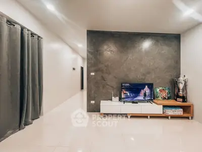 Modern living room with sleek TV setup and stylish decor