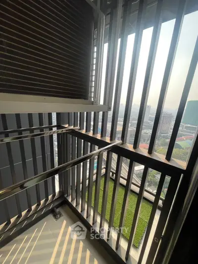 Modern balcony with city view and sleek railing design