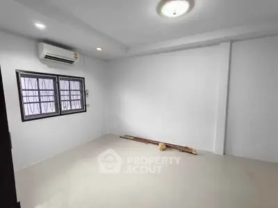 Spacious unfurnished room with air conditioning and tiled flooring, perfect for customization.
