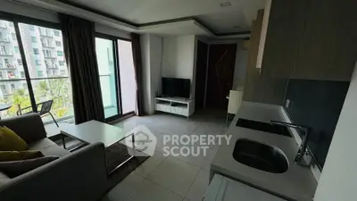 Modern living room with balcony view in contemporary apartment